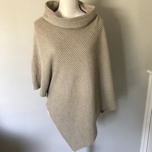 Putorti tan poncho/cape. Size OS.